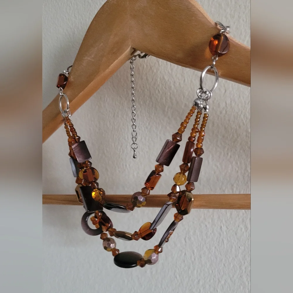 Multi strand silver and amber beaded necklace